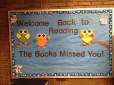 a bulletin board with three owls sitting on a tree branch and the words welcome back to reading, the books missed you