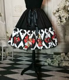 Are you off to a Mad Hatter's Tea party?  Then this may be the perfect skirt for you.    Featuring the Queen of Hearts, Queen Alice, The White Rabbit and other delightful characters from the Lewis Carroll classic all in wonderful vibrant red, black and white.  I've designed this iconic Alice in Wonderland fabric and then created this full 50's style skirt with fun in mind. LIKE THIS FABRIC?  Find all my Alice in Wonderland fabric designs in the Victorian and Steampunk store on Spoonflower.com  - https://www.spoonflower.com/profiles/victorianandsteampunk (check out the Alice in Wonderland collection) NEED A MATCHING TOP HAT?  Find the DIY Print at home matching Mini Top Hat here https://www.etsy.com/au/listing/1296467550 BOOTS - https://www.etsy.com/au/listing/1111363074 Sneakers - https:// Alice In Wonderland Queen, Wonderland Queen Of Hearts, Queen Alice, Alice Costume, Alice Cosplay, The Queen Of Hearts, Alice In Wonderland Costume, Wonderland Costumes, Alice And Wonderland Quotes