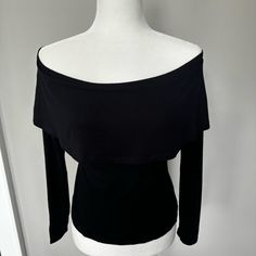 Size Xs Fitted Long Sleeve Off The Shoulder **No Care Tags, This Top Was A Sample** Black Off-shoulder Top For Date Night, Versatile Off-shoulder Black Top, Black Foldover Top For Night Out, Elegant Black Tops For Layering, Elegant Black Foldover Top, Fitted Long Sleeve, Care Tag, Ruffle Top, Off The Shoulder