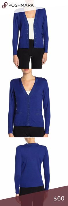 T Tahari Grosgrain Ribbon Trim V-Neck Cardigan Style #TH94343NR Tonal grosgrain ribbon trim elevates this V-neck cardigan with a sophisticated style. - V-neck - Long sleeves - Front button closure - 3 front welt pockets - Grosgrain ribbon trim - Approx. 24" length (size S) - Imported Fiber Content 80% viscose, 20% nylon T Tahari Sweaters Cardigans Chic Spring V-neck Sweater For Workwear, Chic V-neck Cardigan For Office, Blue Stretch V-neck Cardigan, Chic V-neck Cardigan For Formal Occasions, Elegant Fitted V-neck Cardigan, Fitted V-neck Sweater For Spring Layering, Elegant Stretch V-neck Cardigan, Fitted Cardigan For Office, Blue V-neck Sweater For Layering