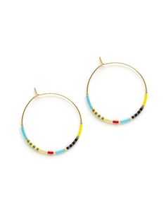 Thin gold filled hoops are loaded with a variety of colorful glass seed beads! Simple and elegant style. Choose from the following colorways: Fiesta: A vibrant mix of red, yellow, gray and turquoise beads. Champagne: A neutral mix of silver, gold, copper, and steel beads. Seashore: A calming mix of blue, green and gold beads. New! Sky: A peaceful mix of ivories and cool toned beads. 2" diameter. Easy hook and eye closure. Handmade in California by customer favorite Amano Studio. Grey Beads, Gold Filled Hoops, Gold Copper, Beaded Hoop Earrings, Beaded Hoops, Glass Seed Beads, Turquoise Beads, Diy Beads, 14kt Gold