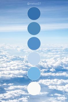 the sky is filled with white clouds and blue hues, as well as four circles