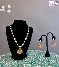 Enhance your ensemble with our Peach Stone and Kundan Necklace Set - a luxurious accessory fit for any occasion! Crafted with top-notch materials, it brings a touch of sophistication to your appearance. Its impeccable design ensures a secure and comfortable fit. Elevate your fashion game with our Peach Stone and Kundan Necklace Set now. Fancy Clutch, Pleated Saree, Bangle Box, Kids Wear Girls, Kundan Necklace Set, Silk Saree Banarasi, Block Print Saree, Fancy Gowns, Silk Thread Bangles