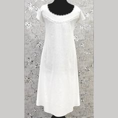 This Charming Vintage Victorian Nightgown Is Crafted From 100% White Cotton, Offering Both Comfort And A Touch Of Classic Elegance. Featuring Short Sleeves, It Blends Historical Style With Modern Convenience. The Soft, Breathable Fabric Is Perfect For A Restful Night’s Sleep, While Delicate Victorian Details Such As Lace Trims Or Embroidered Accents Add A Timeless Touch To Elegant Short Sleeve Nightgown For Bedtime, Elegant Short Sleeve Sleepwear For Wedding Night, Elegant Summer Dresses For Relaxation, Elegant Short Sleeve Nightgown For Loungewear, Elegant Short Sleeve Nightgown, Elegant White Sleepwear For Relaxation, Elegant Fitted Short Sleeve Sleepwear, Elegant Nightgown With Lace Trim For Home, Elegant Short Sleeve Nightgown For Spring