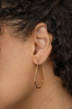 From the Chemistry collection, geometric endless hoops are elongated with hammered facets that catch the light in these perfect earrings. These earrings are the perfect everyday staple: not too big, not too small. You can put these earrings in and know that they will look great, feather light, and just a little unique. - Sterling silver and vermeil in high polish finish- Oxidized silver in satin finish- Endless hoop connection- About 1-3/4" long Earrings Hoops, Feather Light, Earring Patterns, Oxidized Silver, Everyday Jewelry, Satin Finish, Chemistry, Geometry, Hoop Earrings