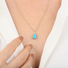 Looking for a meaningful and personalized gift for her? Presenting our 14k Gold Rain Drop Opal Pendant, a customized birthstone necklace that celebrates her unique style and zodiac sign. This minimalist gemstone jewelry perfectly complements her daily outfits while adding a touch of elegance. Crafted with love and care, this pendant is the ideal Christmas gift to show your affection. Surprise her with a piece that captures her personality and brings a smile to her face. Hidden content is love de Gift Pear-shaped Birthstone Jewelry, Teardrop Birthstone Necklace For Gift, Fine Jewelry Teardrop Birthstone Necklace Gift, Blue Teardrop Gemstone Birthstone Necklace, Blue Gemstone Necklace For Birthday Gift, Pear-shaped Birthstone Jewelry Gift, Fine Jewelry Birthstone Teardrop Pendant Necklace As Gift, Teardrop Birthstone Drop Necklace Gift, Blue Gemstone Birthstone Necklace For Gift