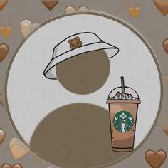 a starbucks cup with a teddy bear hat on it next to a paper cutout