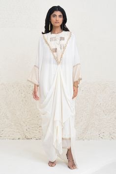 Ivory kaftan kurta with geometric patchwork embellishment and sequin tassel embroidery. Paired with border embellished flared pant. - Aza Fashions Kaftan Kurta, Tassel Embroidery, Kaftan Pattern, Geometric Patchwork, Dhoti Pants, Pant Set, Embroidered Silk, Set For Women, Flared Sleeves