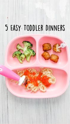 a pink tray filled with different types of food and a toothbrush on top of it