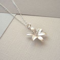 Silver Pendent Designs, Lily Jewelry, Lily Necklace, Silver Pendent, Fleurs Diy, Pretty Jewelry Necklaces, Not On The High Street, Jewelry Accessories Ideas, Classy Jewelry