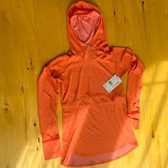 Lightweight Hoodie For Hiking, Running, And Training Coolexchange Technology Offers Sweat-Activated Cooling Sweat-Wicking Fabric Helps You Stay Dry And Cool Engineered Vents For Improved Breathability Raglan Sleeves Allows Better Range Of Motion Flatlock Seams Minimize Chafing And Irritation Secure Zippered Pocket For Keys Or Wallet Orange Hooded Sporty Top, Sporty Orange Hooded Top, Long Sleeve Tops For Light Sports In Spring, Spring Long Sleeve Tops For Light Sports, Cowl Pullover, Mock Neck Sweatshirt, Red Pullover, Quarter Zip Sweatshirt, Pullover Jacket