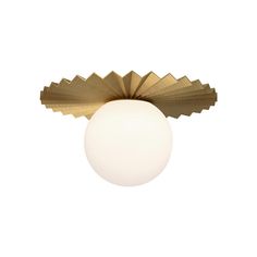 a light that is on top of a white wall mounted fixture with a ball in front of it