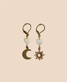 Cute hand-crafted boho earrings. Two 24k gold plated charms, two freshwater pearl hearts and 24k stainless steel gold plated studs pimp your ears up like crazy!  🌸 stainless steel ear studs, 24k gold plated  🌸 anti allergic  🌸 24k gold plated charms 🌙 🌞 moon and sun charms  🐚 real freshwater pearl hearts   This jewellery is your personal talisman. Shine your light with an individually and carefully handcrafted piece, that suits just YOU. You deserve to feel protected, safe and beautiful. T Bohemian Dangle Earrings With Pearl Charm, Handmade Dangle Pearl Earrings In 14k Gold Filled, Handmade Bohemian Pearl Earrings As Gift, Handmade Gold Pearl Earrings For Gift, Handmade Delicate Gold Plated Earrings, Handmade Gold Pearl Earrings As A Gift, Handmade 14k Gold Filled Dangle Pearl Earrings, Gold Dangle Pearl Earrings In Brass, Handmade 14k Gold-filled Dangle Pearl Earrings