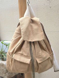 Style: College Categories: Backpack Material: Linen Openway: Button Inner Structure: Cellphone pocket Pattern: Solid Color Gender: Female Size: Large Weight: 780 gram #backpacks #linen #bag #camel Beige Softback Backpack With Pockets, Beige Backpack With Pockets, Beige Backpack With Pockets For Everyday Use, Everyday Use Beige Backpack With Pockets, Khaki Backpack With Pockets For Daily Use, Everyday Beige Backpack With Pockets, Beige Backpack With Cell Phone Pocket For Everyday Use, Beige Travel Backpack With Cell Phone Pocket, Style College