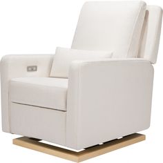 a white recliner chair sitting on top of a wooden base