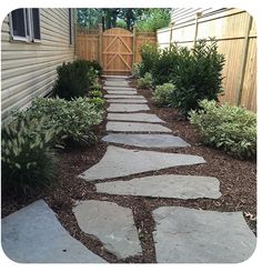 a stone path in front of a house