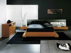 a modern bedroom with black and white decor