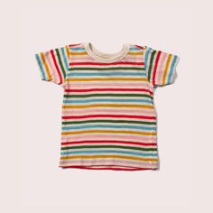 Shop our Rainbow Striped Short Sleeve T-Shirt, part of our Baby & Toddler Tops collection. Order now & get free delivery on orders over £50! Striped Tshirt, Toddler Tops, Striped Short Sleeve Shirt, Spring Weather, Free Dresses, Rainbow Kids, Striped Short, Organic Cotton Fabric, Rainbow Stripes