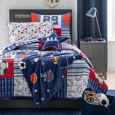 With the Skyler Sport Quilt Set in Navy, you'll be ready to score the winning goal in your dreams! Because with this navy quilt set, you'll be practicing your sports moves even when you're asleep! Not only is it easy to care for and wrinkle-resistant, but it's also OEKO-TEX certified, which means you don't have to worry about any harmful substances. Plus, it's machine washable, so you can wash out any sweat that may have come from all that practicing. So get your head in the game, and let the Sk Kids Sports Bedroom, Sports Room Boys, Boy Sports Bedroom, Baseball Quilt, Sports Bedding, Sports Quilts, Sport Bedroom, Big Boy Bedrooms, Boys Home