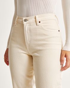 Our Curve Love 90's-style jeans in a neutral bone wash with a clean hem. This fit features a 9.5” mid rise, is fitted at the waist and hips, and eases at the thigh into a straight, full-length leg shape. Our Curve Love styles add an additional 2” at the hip and thigh to allow room for your curves and eliminate waist gap. This jean is made from our vintage stretch fabric which features both an authentic vintage look and contains slight built-in stretch for additional comfort. 90s Style Jeans, Mid Rise Straight Jeans, Color Bone, Bone Color, Denim Collection, 90s Fashion, Jeans Style, Straight Jeans, Vintage Looks