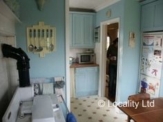 a kitchen filled with appliances and lots of counter space