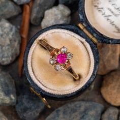 This antique ruby and diamond ring features an oval cut ruby in the center with four rose cut diamond accents. This ring is crafted in 14k rose gold and currently a size 8. Oval Rose Gold Ruby Ring With Rose Cut Diamonds, Formal Rose Gold Ruby Ring With Rose Cut Diamonds, Antique Pink Ruby Ring With Rose Cut Diamonds, Heirloom Rose Gold Oval Ruby Ring, Vintage Rose Gold Ruby Ring, Ruby Diamond Ring, Ruby And Diamond Ring, Ruby Diamond Rings, Ruby Diamond