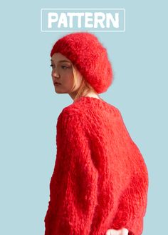 a woman wearing a red sweater and hat with the words pattern over her head in white