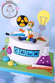 a birthday cake decorated with an image of a scientist