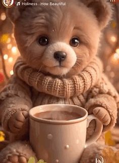 a teddy bear holding a cup of coffee