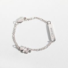 This gorgeous teddy bear identification bracelet is fun for your animal lover girls. This little tag ID charm bracelet is entirely made of 925 sterling silver which is suitable for children with sensitive skin. She will adore this girl's fine jewelry gift and surely cherished for years to come. A complimentary gift box is included. Cute Silver Hypoallergenic Bracelets, Cute Hypoallergenic Silver Bracelets, Cute Silver Name Bracelet For Gift, Cute Silver Name Bracelet Gift, Silver Name Bracelet Cute Gift, Adjustable Sterling Silver Hypoallergenic Name Bracelet, Cute Silver Name Bracelet, Adjustable Hypoallergenic Sterling Silver Name Bracelet, Silver Dainty Name Bracelet With Birthstone