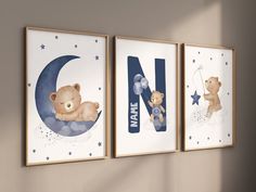 three children's wall hangings with teddy bears and the letter n on them