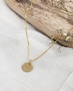 Embrace the beautifully imperfect nature of being human with a personalized hammered coin necklace. The 1/2'' coin creates space for a simple yet powerful statement. Inscribe a message that nurtures your soul and let it guide you through your journey of healing and growth. The hand-hammered charm is a reminder to embrace your authentic self, including the flaws and uniqueness that make you YOU. Crafted with high-quality 14k gold-filled or .925 sterling silver, this necklace offers modern and min Being Human, Gold Coin Necklace, Word Bracelet, Daily Affirmation, Small Studio, Authentic Self, Layered Bracelets, Coin Necklace, Personalized Necklace