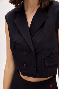 Elevate your ensemble with the Woven Crop Vest, a chic addition to any outfit. Featuring a contemporary cropped design, this vest is crafted from high-quality woven fabric that offers both texture and structure. The clean lines and minimalist aesthetic make it a versatile piece, perfect for layering over a blouse or pairing with high-waisted trousers. Whether for a casual day out or a sophisticated evening look, this crop vest adds a touch of modern elegance to your wardrobe. Embrace effortless Chic Cropped Vest For Workwear, Chic Cropped Vest For Work, Chic Black Cropped Vest, Elegant Fitted Cropped Vest, Black Sleeveless Crop Top For Work, Chic Fitted Cropped Vest, Crop Vest, July Birthstone Jewelry, Cropped Vest