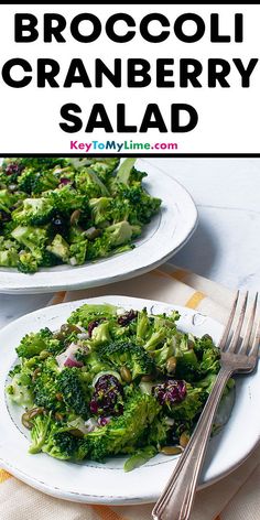 broccoli cranberry salad is served on two white plates with silverware