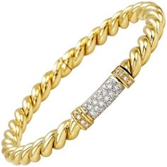 Rope bangle in 18 kt yellow gold and white diamonds This is a traditional collection in Micheletto the total weight of the gold is gr 22.40 the total weight of the white diamonds is ct 0.58 - color GH clarity VVS1 STAMP: 10 MI ITALY 750 The full set is available Luxury White Gold Bracelet With Pave Setting, Luxury Yellow Gold Diamond Bracelet With Brilliant Cut, Luxury Brilliant Cut Yellow Gold Diamond Bracelet, Luxury Diamond Bracelet In Yellow Gold, Luxury Yellow Gold Diamond Chain Bracelet, Luxury Yellow Gold Diamond Bracelet With Single Cut, Exquisite Yellow Gold Bracelet With Diamonds, Luxury Gold Bracelet With Pave Setting For Formal Occasions, Elegant Gold Bracelet With Diamond Accents In Diamond White