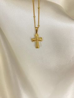 This double sided cross necklace is the perfect symbol of faith and religion. These necklaces feature a unique gold cross pendant perfect to show your faith everyday with the same cross design on both sides.  -18k gold plated (stainless steel) -packaged in a pouch/box -waterproof/ tarnish resistant Gold Minimalist Tarnish Resistant Cross Necklace, Gold Spiritual Cross Necklace Tarnish Resistant, Spiritual Gold Cross Necklace Tarnish Resistant, Dainty Gold Crucifix Cross Necklace, Everyday Spiritual Cross Pendant Necklace, Gold Cross Necklace With Adjustable Chain, Gold Tarnish-resistant Cross Pendant Necklace, Gold Spiritual Cross Pendant Necklace, Spiritual Gold Cross Necklace