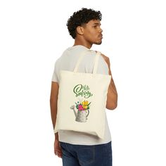 This 100% cotton bag comes in one size - 15" x 16"- perfect for everyday wear. It's durable and will last for years. The bag features 20" handles (made from the same canvas), making it easy to carry even with a week's worth of shopping. .: 100% cotton canvas .: Available in natural and black colors .: Heavy fabric (12 oz/yd² (406.9 g/m .: Sewn-in label White Canvas Bag For Spring, Spring Canvas Shopping Bag, Spring Shopping Canvas Bag, White Flower-shaped Canvas Bag For Spring, Spring Shopping Canvas Cotton Bag, Spring Cotton Canvas Shopping Bag, Spring Canvas Tote Bag As Gift, Spring Shopping Canvas Gift Bag, White Cotton Canvas Bag For Spring