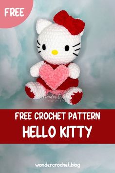 a crocheted hello kitty stuffed animal holding a heart with the text free crochet pattern