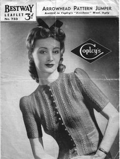 an old photo of a woman with her hands on her hips, wearing a sweater