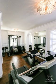 the gym is clean and ready for people to use it as an exercise center in this home