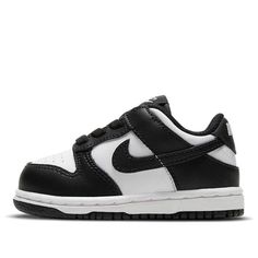 Best gifts for newborns/babies! The Nike Dunk Low TD Black White is a toddlers shoe that features a classic black and white colorway. It is made with leather and has a white base with black overlays. The Swoosh branding is black, and the shoe has a lightly padded nylon tongue. The tooling is two-toned, with a rubber outsole that draws from the Air Jordan 1 for traction. Nike Custom Black And White Low-top Sneakers, Toddler Jordans, Low Dunks Black And White, Nike Panda Dunks Toddler, Nike Dunks Low Black White, Nike Black And White Low-top Sneakers, Baby Boy Shoes Nike, Baby Nike Shoes, Toddler Nike Shoes