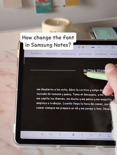 someone is writing on an ipad with the caption how change the font in samsung notes?