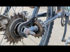 the front wheel of a bicycle with rust on it