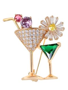 PRICES MAY VARY. Features - this fashion brooch features a cocktail glass design, adorned with an array of sparking clear/ multicolored crystal rhinestones, and a silvery/gold tone metal alloy base. It's very eye-catching and will beautifully complement any outfit Versatile jewelry - this unique cocktail glass brooch accessory can be used with all kinds of womens outfits, adding a nice little accent to make your style pop. Wear this pin on a collar, dress, tablecloths, sweater, scarf, shawls, ha Elegant Crystal Pins For Party, Gold Crystal Brooches For Party, Glamorous Rhinestones Brooches For Party, Gold Rhinestone Pins For Party, Gold Rhinestone Party Pins, Red Jewerly, Purple Cocktails, Womens Outfits, Ribbon Bracelets