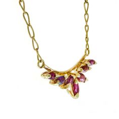 "Splendid and elegant, this vintage necklace is perfect for that special evening out or to coordinate with any ensemble from business casual to everyday wear. This necklace is for that special night out! Crafted in 18k yellow gold, this necklace features marquise-cut rubies. Sparkling with 0.35 carat total weight of rubies and a polished shine, this queenly necklace secure comfortably with spring ring clasp. Give this necklace for rewarding yourself or someone who special for you. Necklace weigh Yellow Gold Costume Jewelry Necklace With Jewels, Yellow Gold Costume Jewelry Necklaces With Jewels, Fine Jewelry Necklaces With 17 Jewels For Parties, Evening Pendant Necklace With Jewels, Luxury Gold Emerald Necklace For Party, Fine Jewelry 14k Gold Necklace For Evening, Vintage Gold Emerald Necklace For Formal Occasions, Yellow Gold Fine Jewelry Necklace For Party, Marquise Gemstone Necklace For Formal Occasions