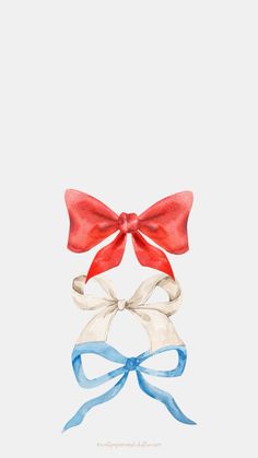 three bows with blue and red ribbons on them