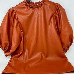 New With Tags! Thml Short Sleeve, Faux Leather Top In Rust. Size Xs. Darling Ruffle Detail At The Neck And Balloon Sleeves. Great For Game Day Or Any Fun Event. Super Cute! Leather Short Sleeve Shirt, Faux Leather Top, Leather Short, Fun Events, Leather Shorts, Balloon Sleeves, Leather Top, Game Day, Short Sleeve Shirt