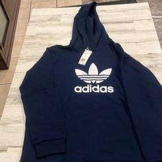 Cozy Sweater Blue Cotton Adidas Hoodie, Blue Adidas Hoodie For Winter, Blue Adidas Hooded Sweatshirt, Adidas Blue Sweatshirt For Winter, Adidas Blue Hoodie For Fall, Adidas Blue Winter Sweatshirt, Adidas Blue Hooded Hoodie, Blue Adidas Casual Sweatshirt, Blue Hooded Adidas Sweatshirt