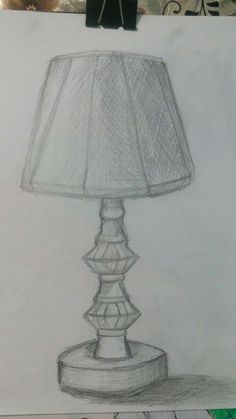 a drawing of a lamp on a piece of paper