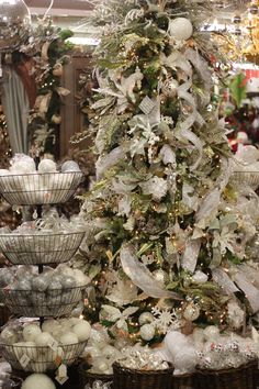 a decorated christmas tree in a store